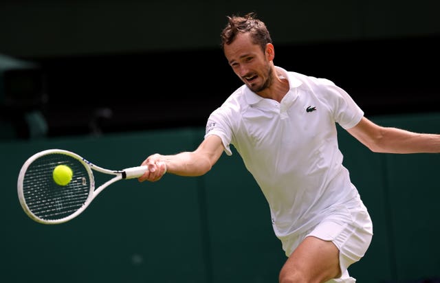 Daniil Medvedev hits a forehand