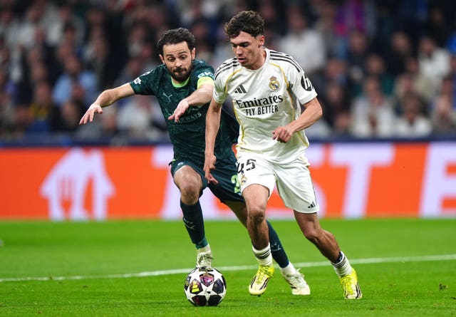 Manchester City’s Bernardo Silva (left) and Real Madrid’s Thiago Pitarch battle for the ball