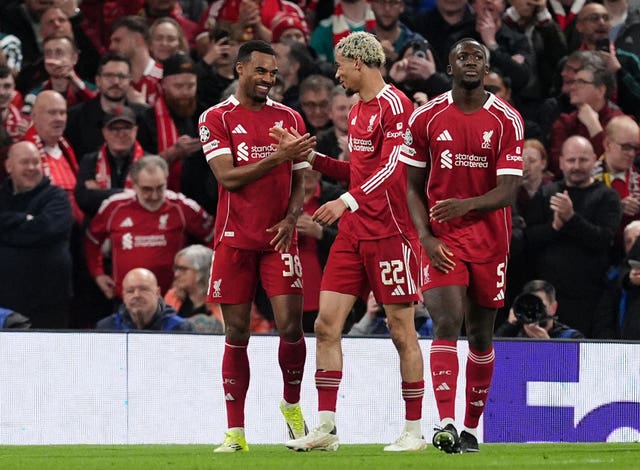 Gravenberch and Ekitike celebrate